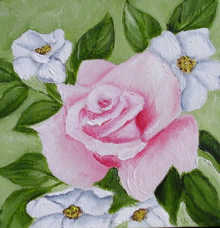 Lyserød rose med hvide blomster